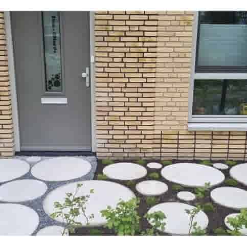 Ronde grijze staptegel 27 cm – Rustique Beton met een natuurlijk geleefd karakter