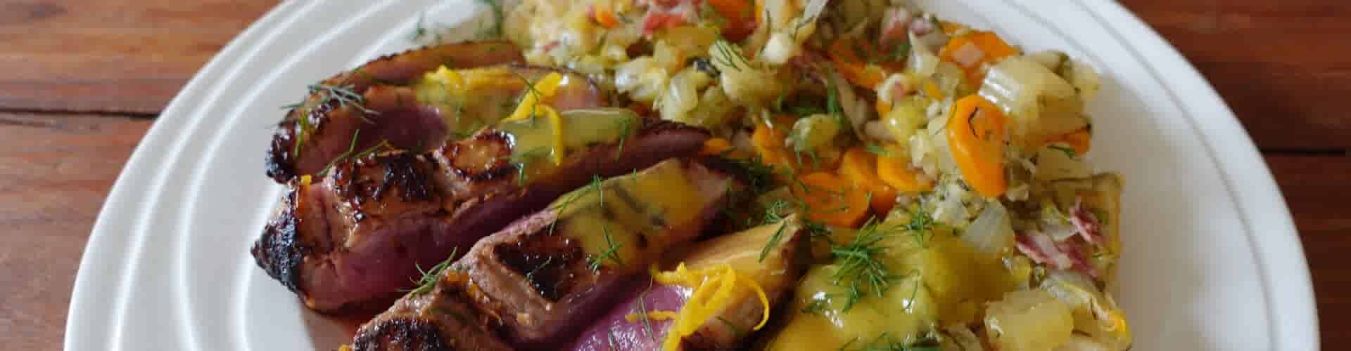 Eendenborstfilet met groentenstoof en sinaasappelsaus