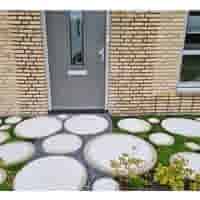 Ronde grijze staptegel 23 cm – Rustique Beton  met een natuurlijk geleefd karakter