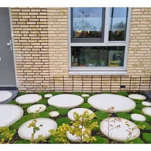 Ronde grijze staptegel 55 cm – Rustique Beton  met een natuurlijk geleefd karakter